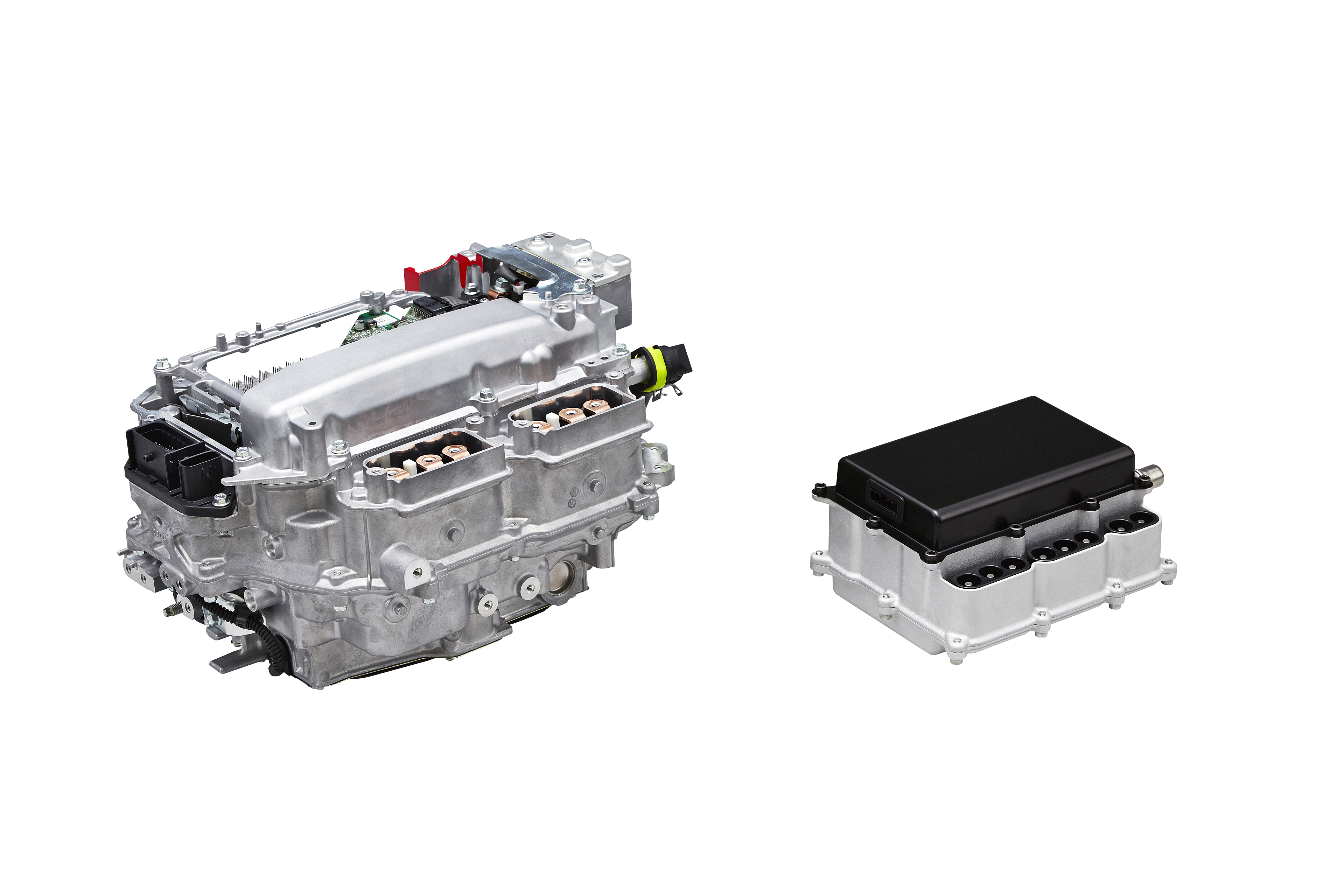 Left: PCU with silicon power semiconductors (Production model) Right: PCU with SiC power semiconductors (Future target)